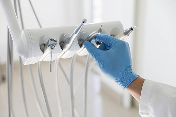 Professional Tooth Extraction technician working in Freeport, TX